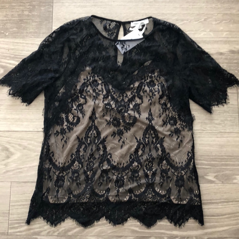 Black Lace top. Never worn!! Size Small.
